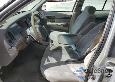 1999 Mercury Grand Marquis Gs z USA, uszkodzony, nr VIN 2MEFM74WXXX635856